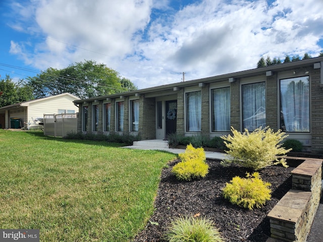 view of front of house with a front yard