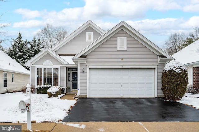 front of property featuring a garage