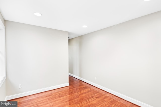 spare room with light wood-type flooring