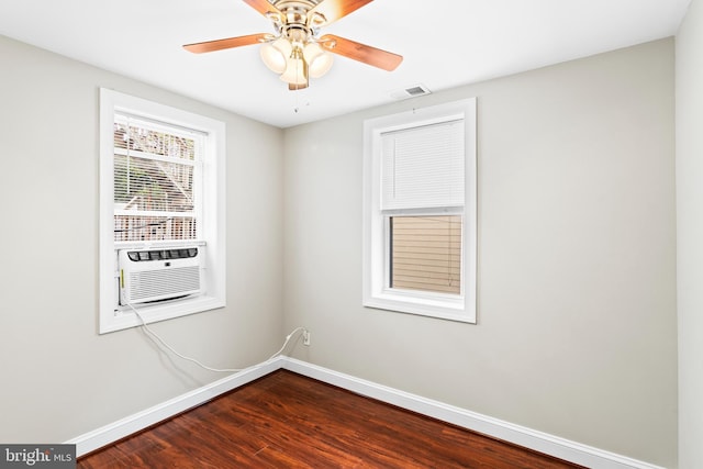 unfurnished room featuring cooling unit, ceiling fan, and hardwood / wood-style floors