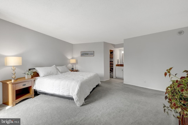 bedroom with light carpet