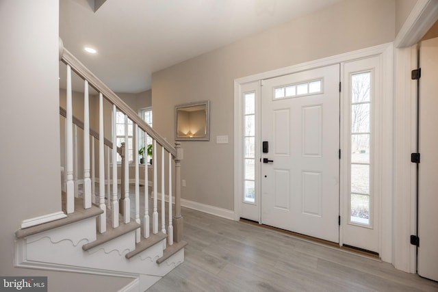 entrance foyer featuring light hardwood / wood-style floors