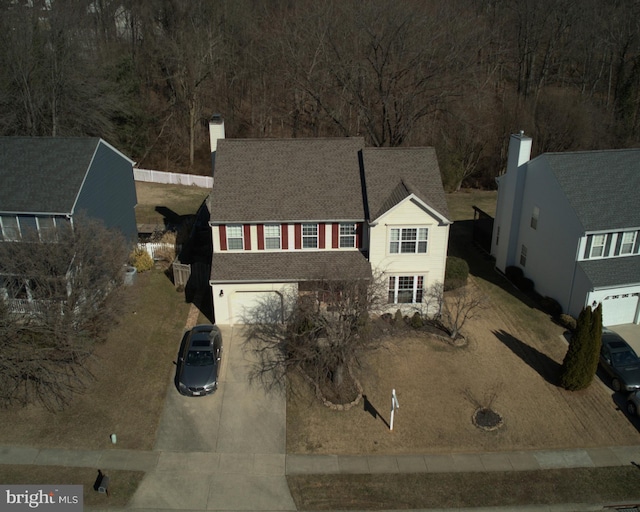 view of front of home featuring a garage and driveway