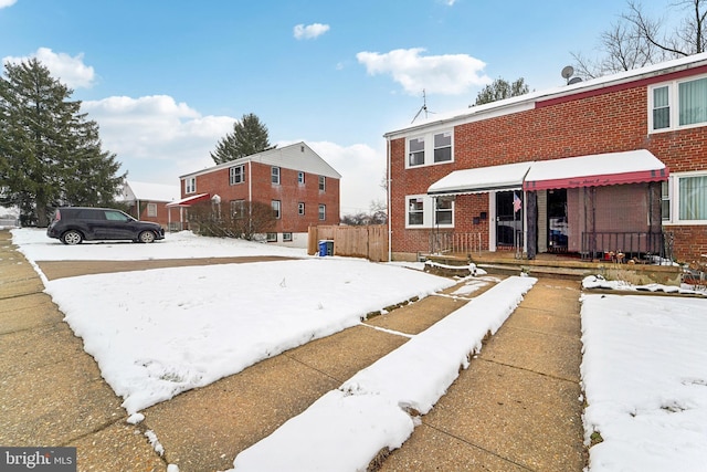 view of yard layered in snow