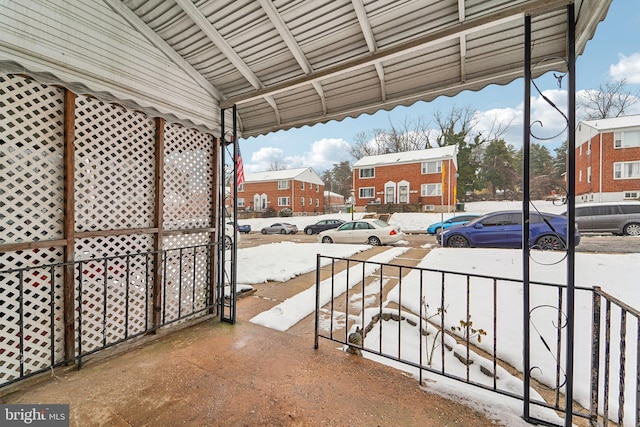 view of snow covered patio