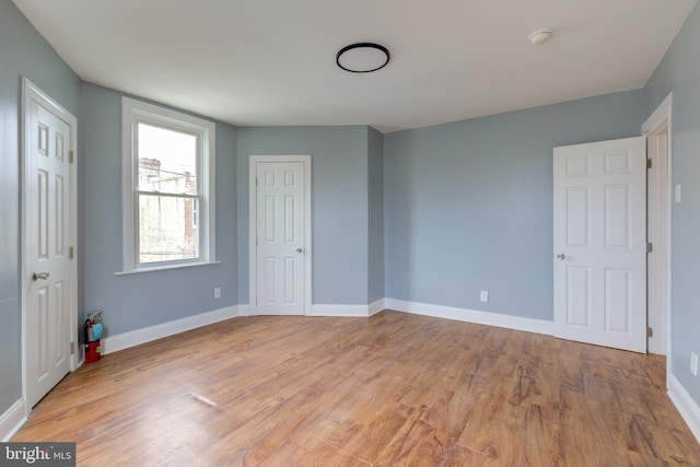 unfurnished bedroom featuring light hardwood / wood-style floors