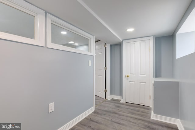 corridor featuring hardwood / wood-style flooring