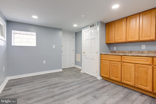 kitchen with light hardwood / wood-style flooring