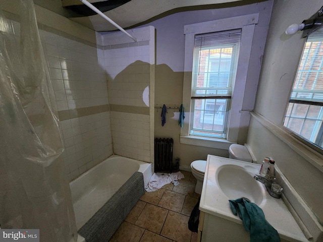 full bathroom featuring shower / bathtub combination with curtain, radiator heating unit, toilet, and plenty of natural light