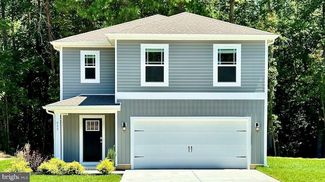 view of front of house with a garage