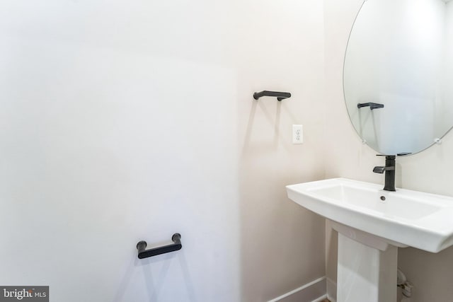 bathroom featuring baseboards