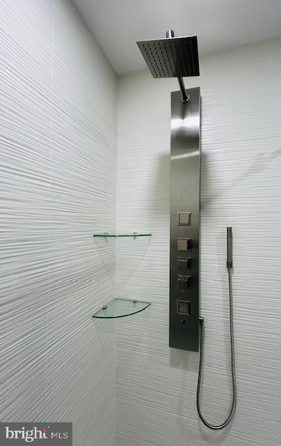 interior details with a shower