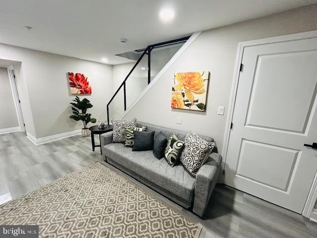 living room with light hardwood / wood-style floors