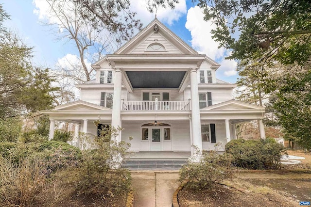 view of front facade featuring a porch and a balcony