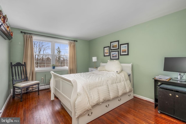 bedroom with dark wood-type flooring