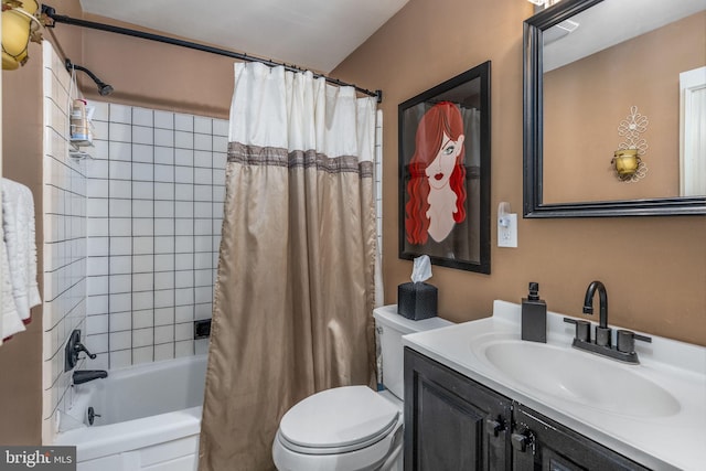 full bathroom featuring vanity, toilet, and shower / bath combo with shower curtain