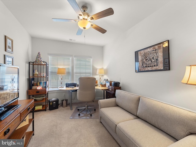 office area with ceiling fan and light colored carpet