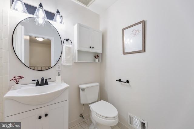 bathroom featuring tile patterned flooring, visible vents, baseboards, toilet, and vanity