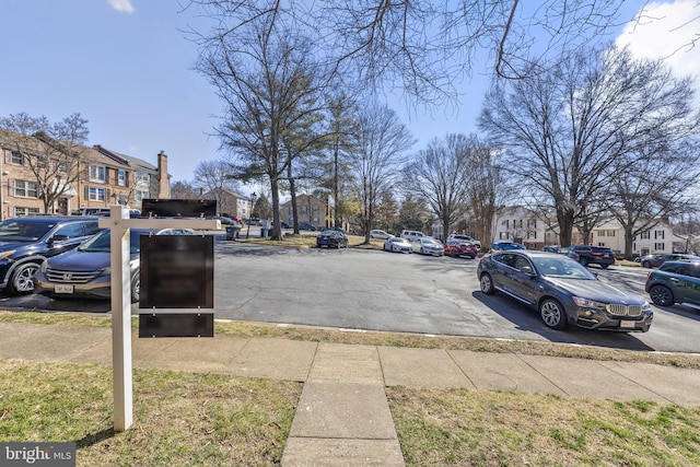 view of road featuring sidewalks and a residential view