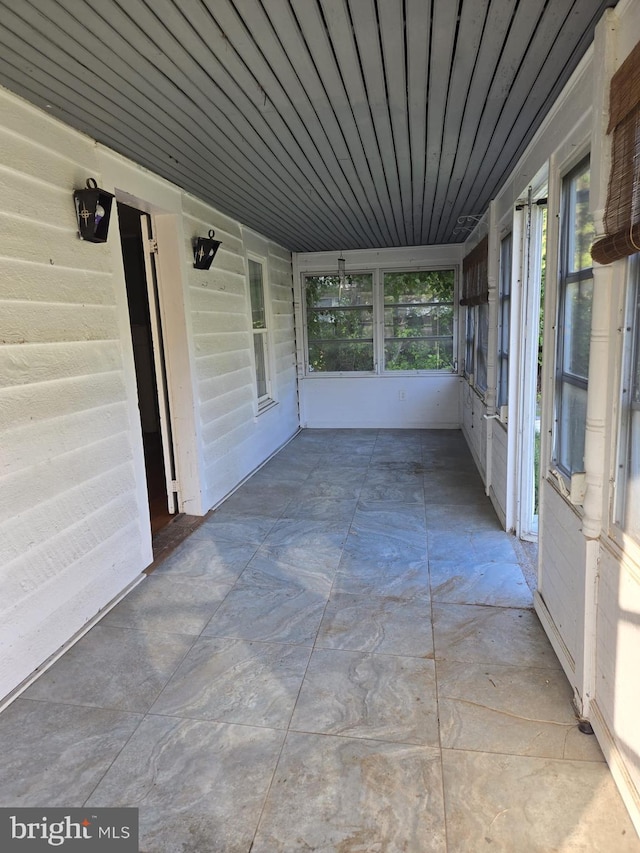 view of unfurnished sunroom