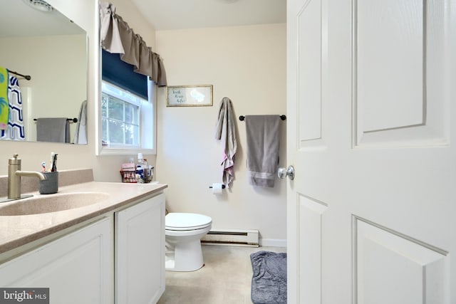 bathroom with toilet, baseboard heating, and vanity