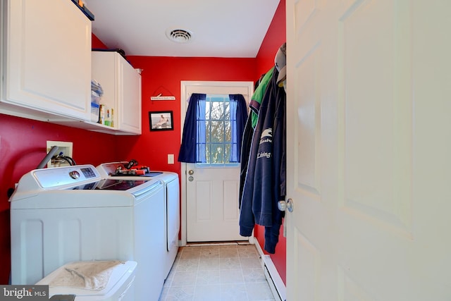 clothes washing area with cabinet space, baseboard heating, visible vents, and washer and clothes dryer