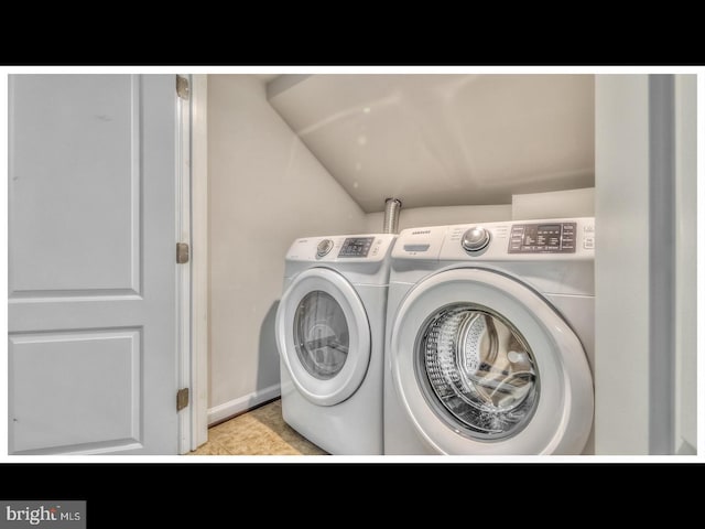 laundry room with washer and clothes dryer