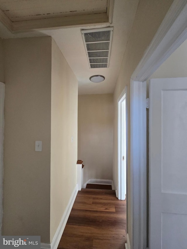 corridor with dark hardwood / wood-style floors