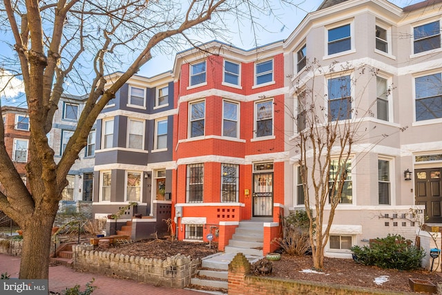 multi unit property featuring brick siding