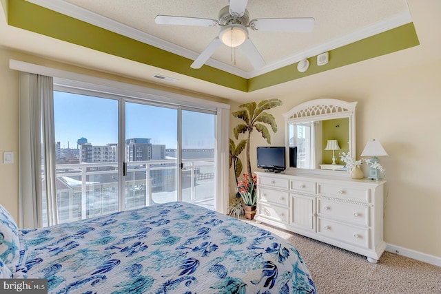 bedroom featuring access to exterior, light colored carpet, visible vents, ornamental molding, and baseboards