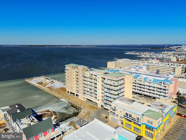 drone / aerial view with a view of city and a water view