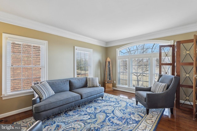 living room with dark wood-style floors, baseboards, and crown molding