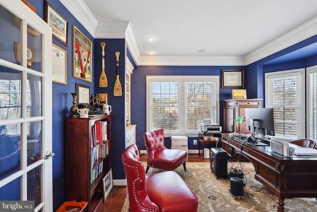 home office featuring ornamental molding, baseboards, and wood finished floors