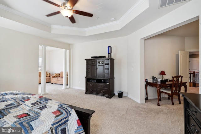 bedroom with light carpet, decorative columns, visible vents, a raised ceiling, and ornamental molding