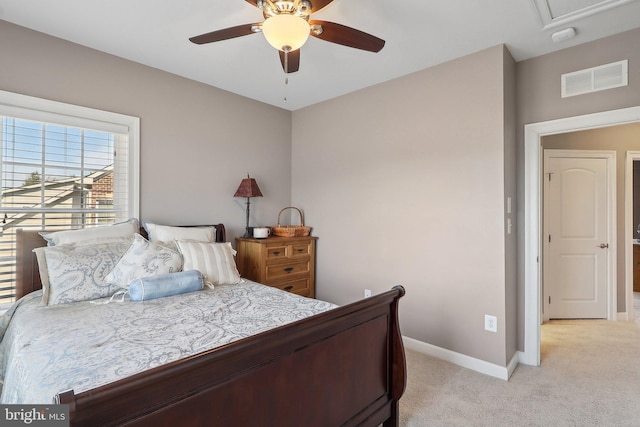 bedroom with light carpet, baseboards, visible vents, and a ceiling fan