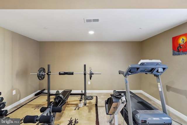 exercise room with recessed lighting, carpet, visible vents, and baseboards