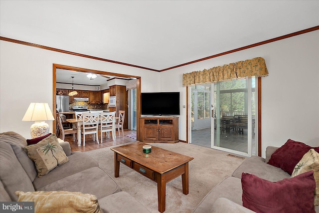 10133 Queens Cir, Ocean City, MD 21842 - living room featuring light colored carpet, visible vents, and crown molding