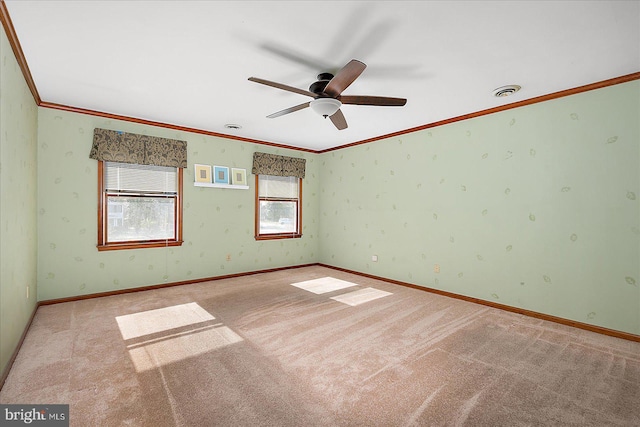 10133 Queens Cir, Ocean City, MD 21842 - unfurnished room with crown molding, baseboards, wallpapered walls, a ceiling fan, and light carpet