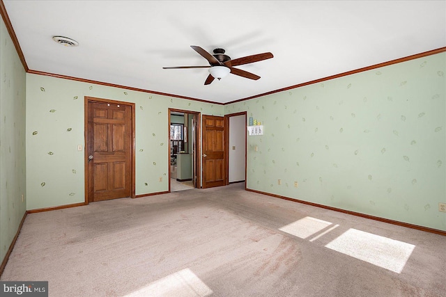 10133 Queens Cir, Ocean City, MD 21842 - unfurnished bedroom with baseboards, visible vents, crown molding, and light colored carpet