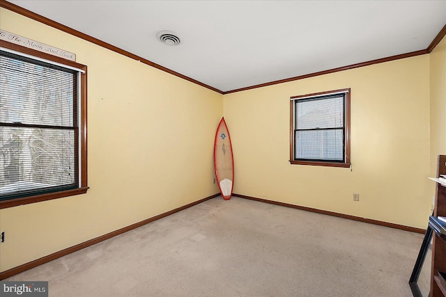 10133 Queens Cir, Ocean City, MD 21842 - empty room featuring light carpet, crown molding, baseboards, and visible vents