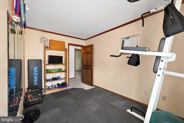 10133 Queens Cir, Ocean City, MD 21842 - workout area with baseboards and ornamental molding