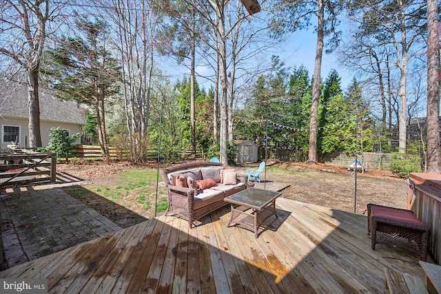 10133 Queens Cir, Ocean City, MD 21842 - wooden terrace with a fenced backyard, an outbuilding, an outdoor living space, and a storage shed