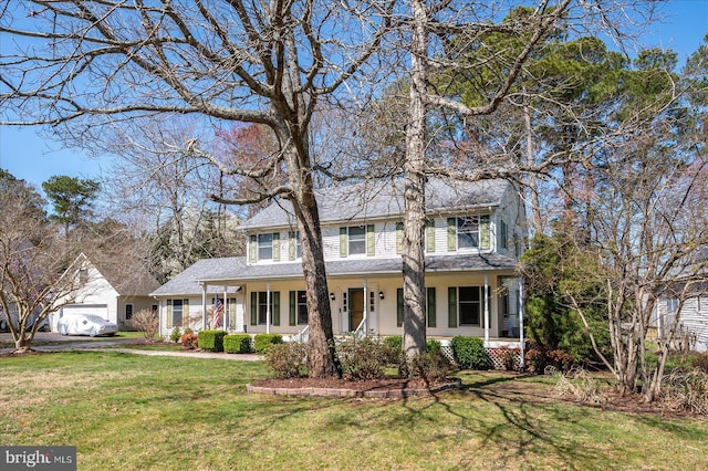 10133 Queens Cir, Ocean City, MD 21842 - colonial home featuring covered porch and a front lawn