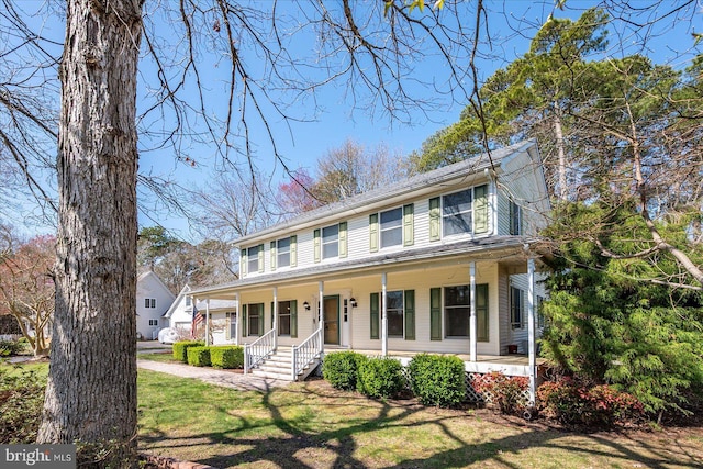 10133 Queens Cir, Ocean City, MD 21842 - view of front of property with covered porch and a front yard