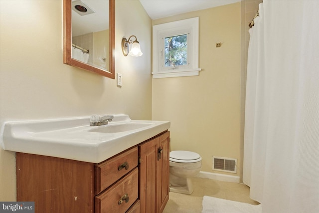 bathroom with visible vents, vanity, tile patterned floors, toilet, and a shower with shower curtain