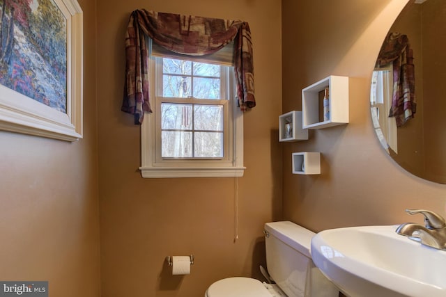 bathroom with sink and toilet