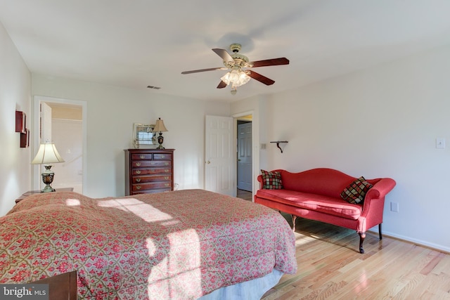 bedroom featuring light hardwood / wood-style flooring and ceiling fan