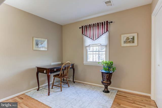 office area with light hardwood / wood-style flooring