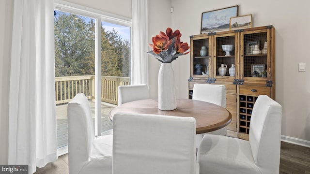 dining area featuring hardwood / wood-style flooring