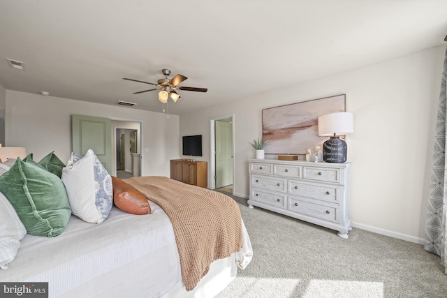 bedroom featuring ceiling fan and light colored carpet